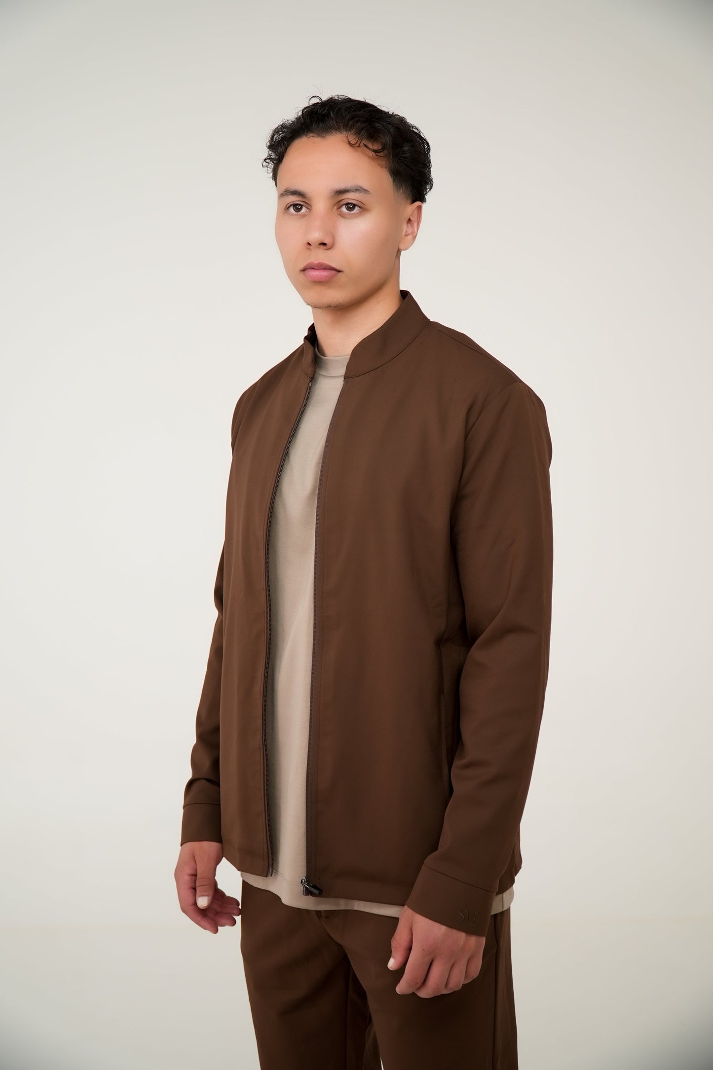 Het essentiële Mavéron trainingspak in mokkabruin